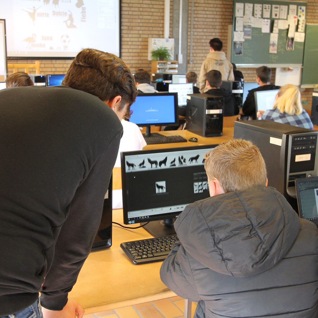 Leerling en leerkracht Grafische technieken aan het werk